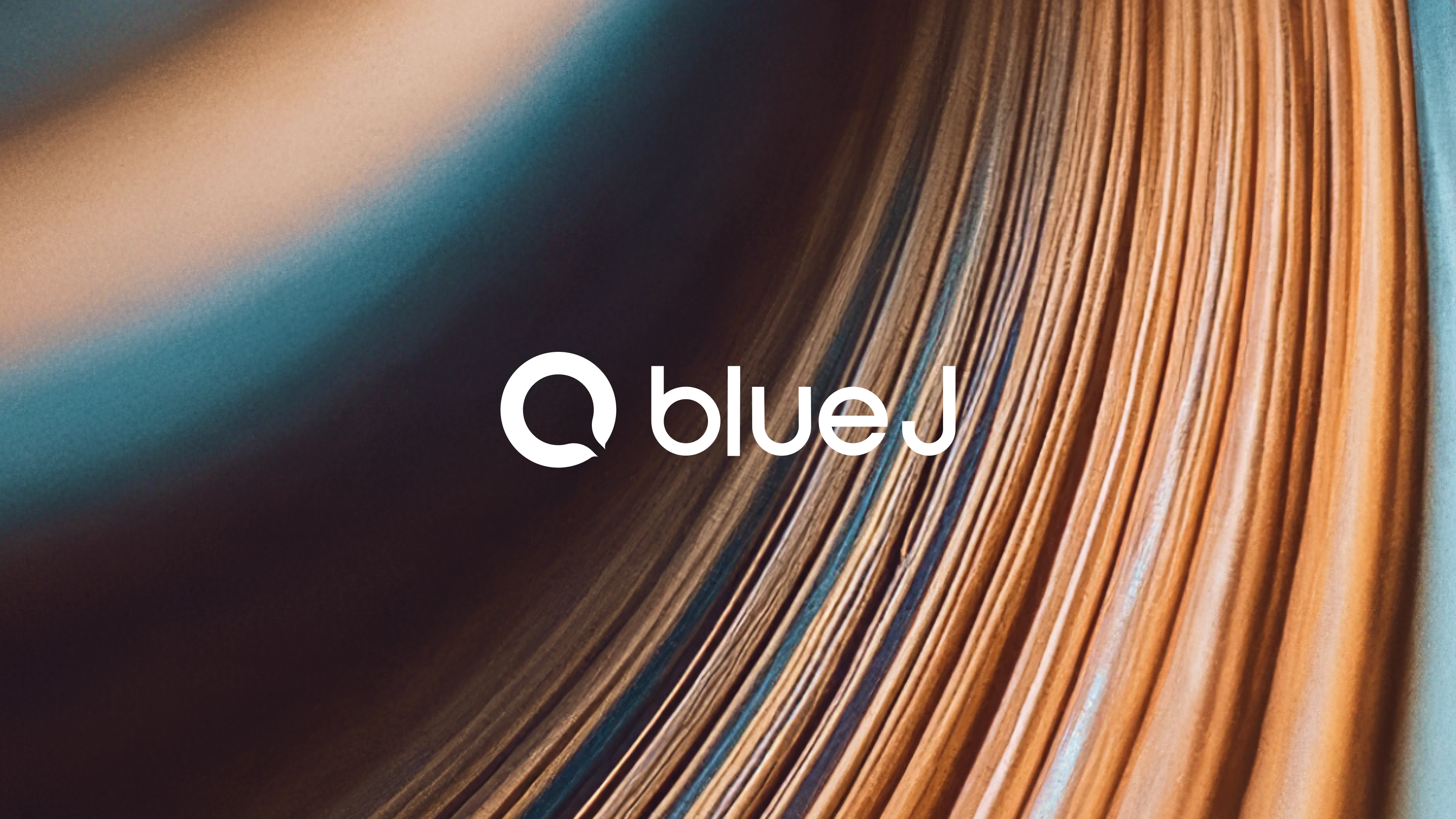 Blue J logo in white centered on an abstract background featuring flowing textures in warm copper and cool blue tones.