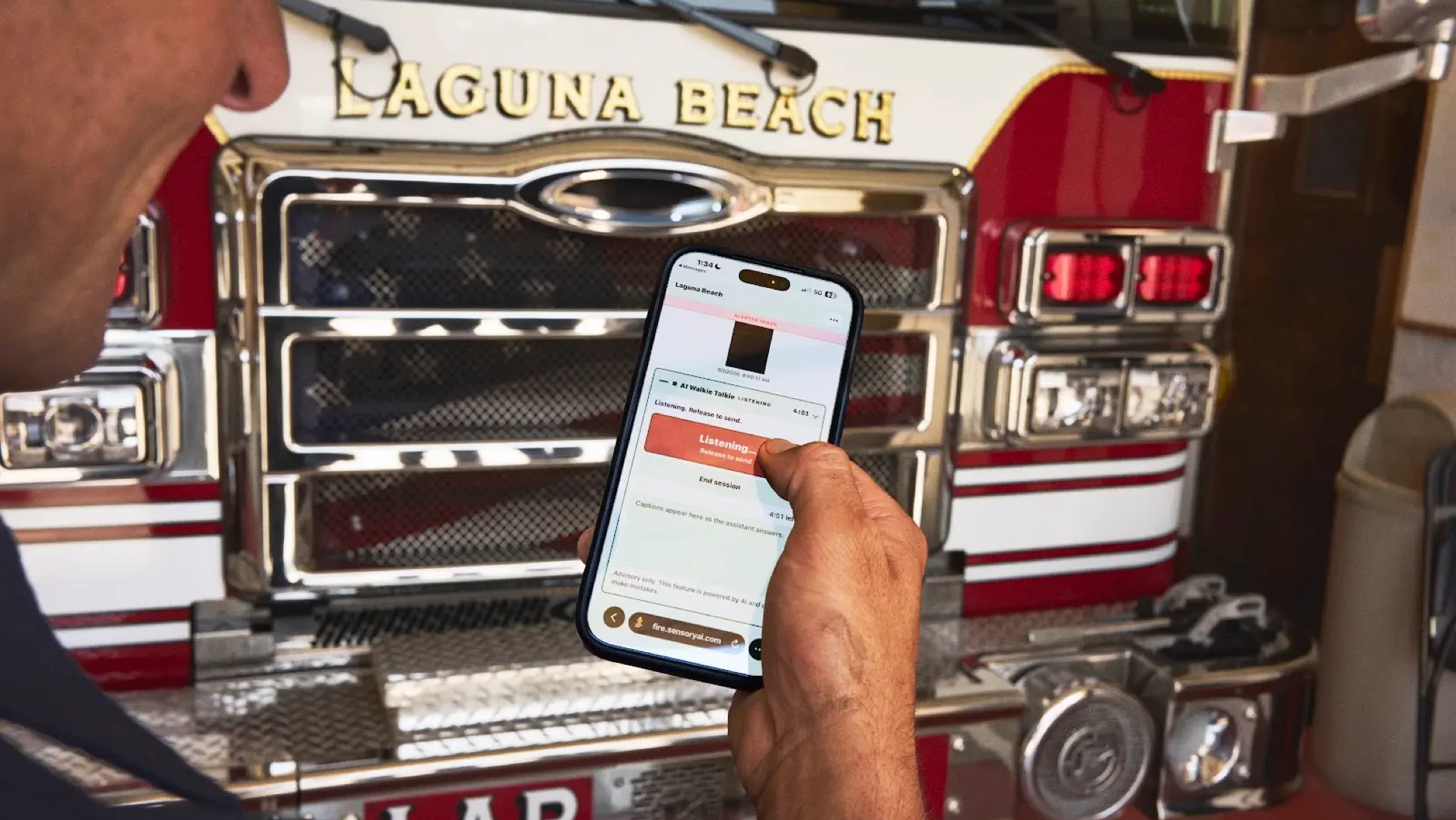 Ryan demonstrates a wildfire detection interface to firefighters.