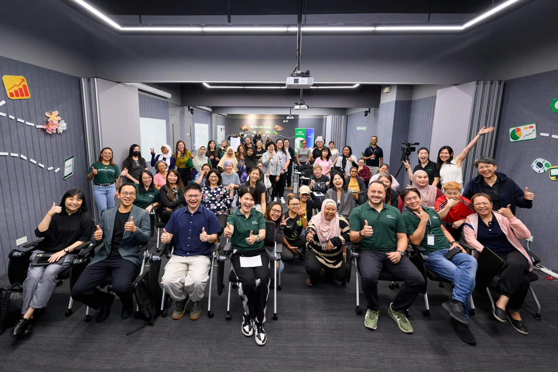 Group photo at the GO Forward with AI launch in Singapore with organisers and women driver-partners.