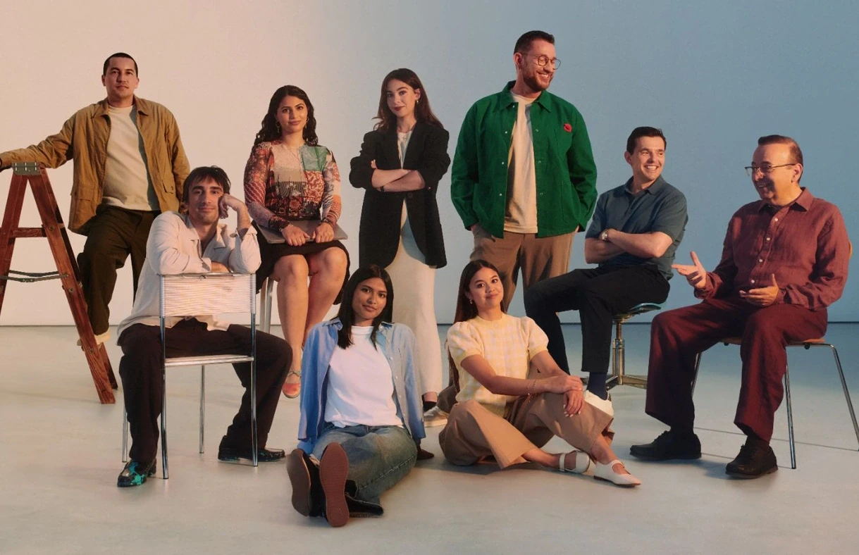 Group portrait of the Codex Originals builders, seated and standing in a studio.