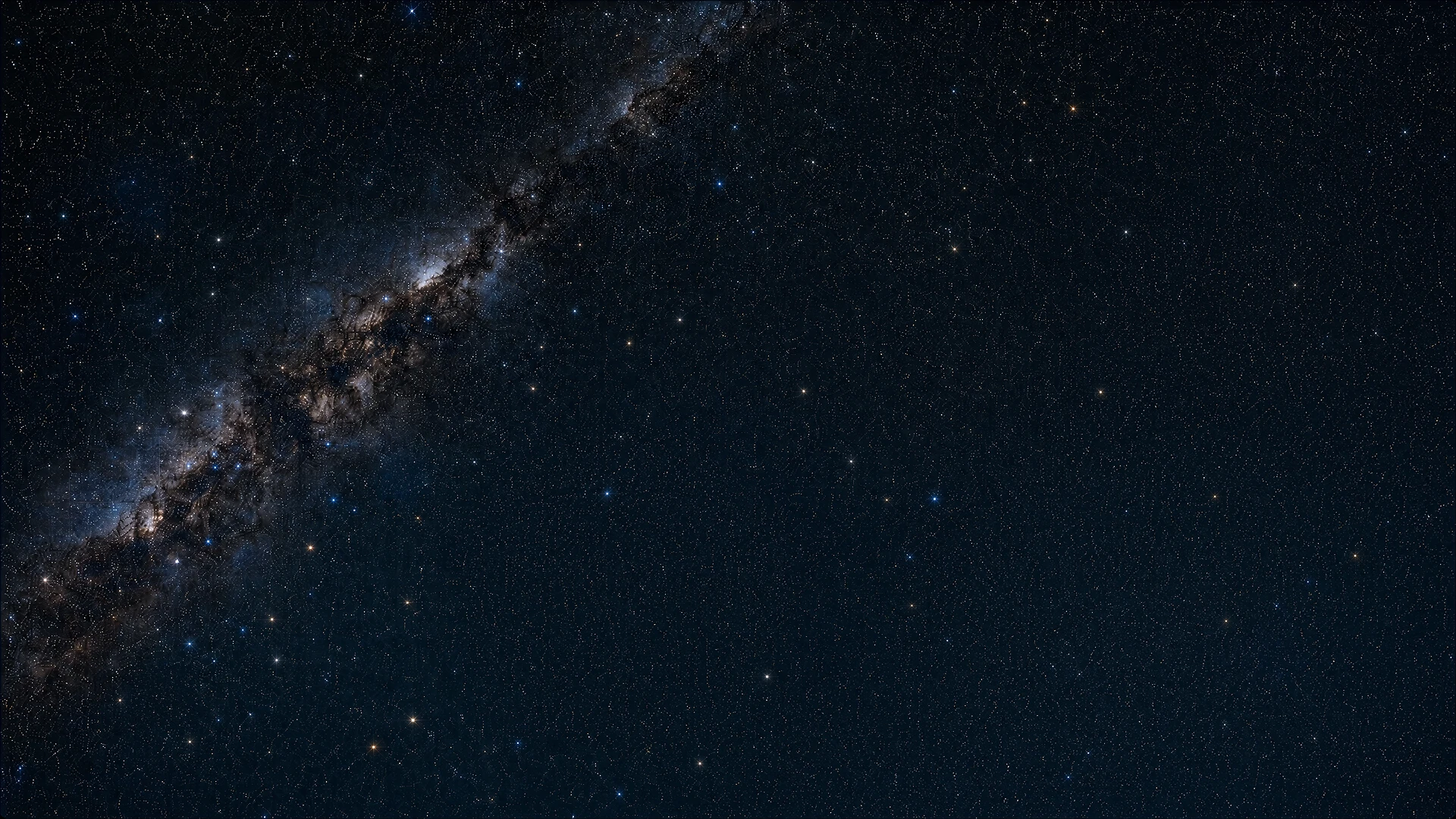 A cratered moon and planet illuminated by a sunrise against a dense star field.