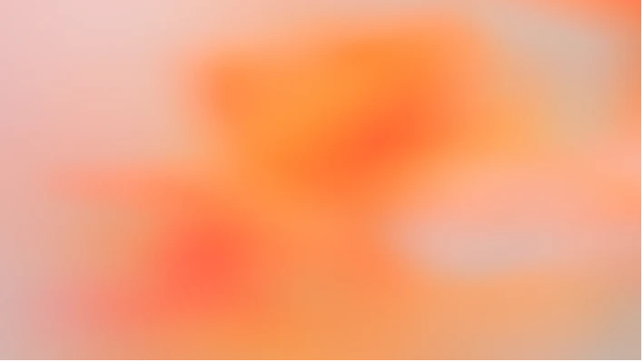 Abstract gradient background blending soft teal, peach, and beige tones with blurred orange shapes.