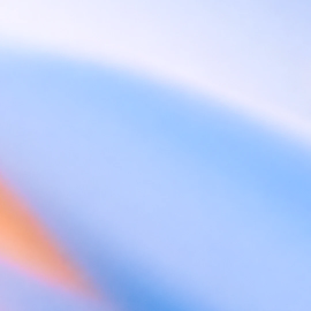 Abstract blue, lavender, and peach gradient artwork.