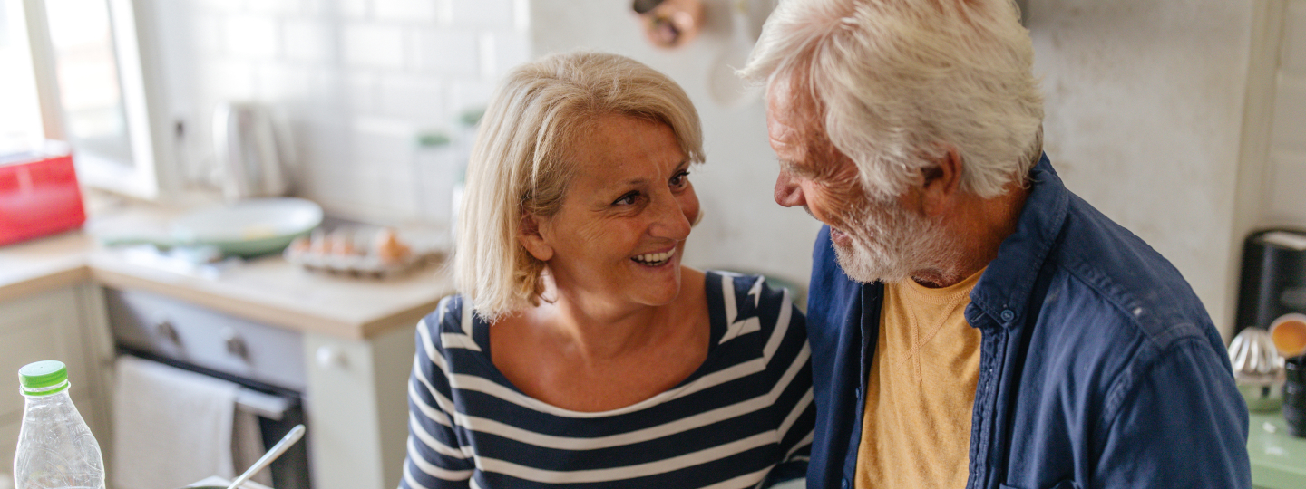 Mature woman smiling at her father