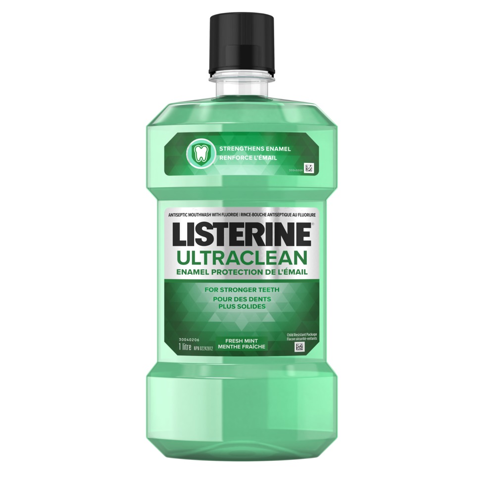 A bottle of LISTERINE Ultraclean® Enamel Protection Mouthwash, 1L with a logo of the Canadian Dental Association approval in the background.