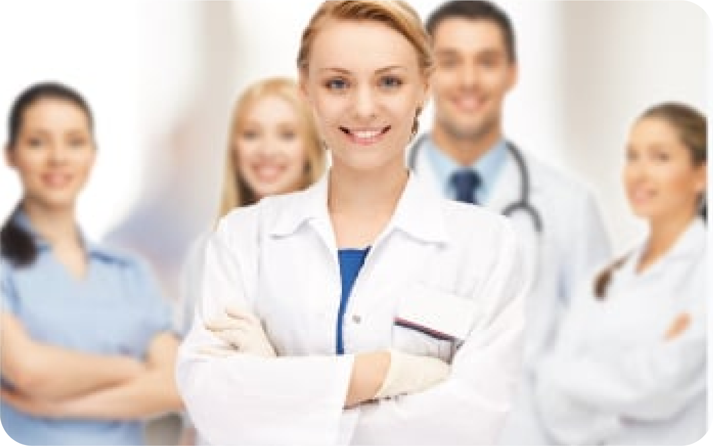 Stock image of five healthcare professionals standing together