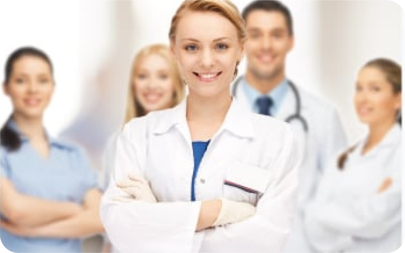 Stock image of five healthcare professionals standing together