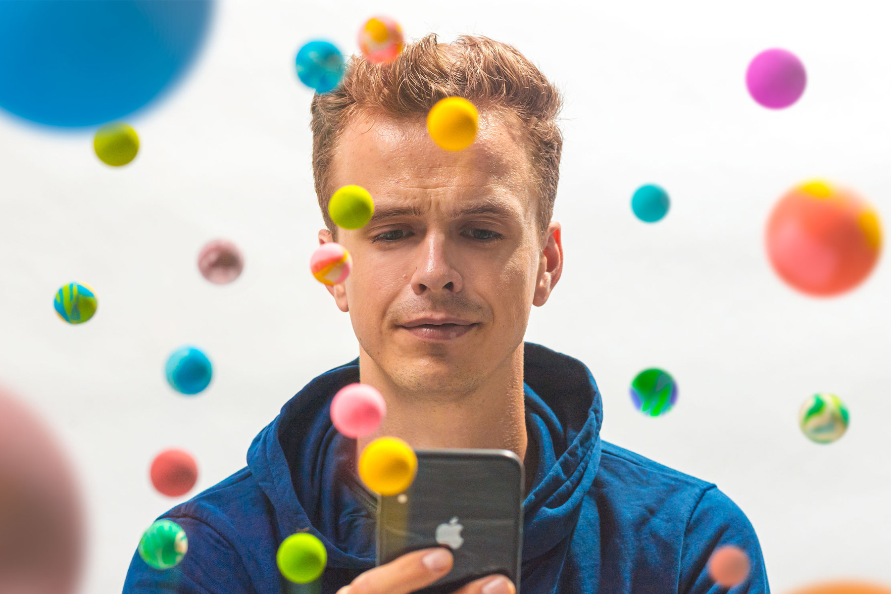 A man with balls and a smartphone