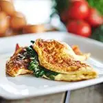 Keto Cheddar Omelet with Swiss Chard and Onions 