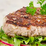 Rosemary Turkey Burger Over Baby Kale Salad