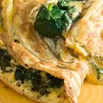 Cheddar Omelet with Sautéed Watercress