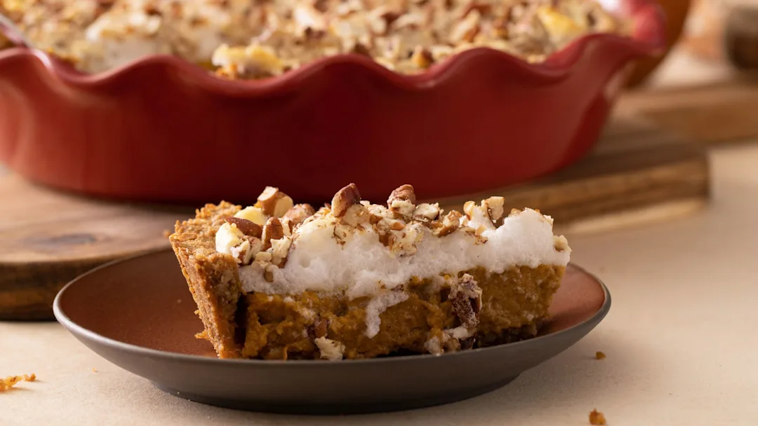 pumpkin-pie-topped-with-meringue-and-toasted-nuts