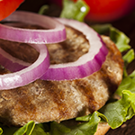 Turkey Burger with Chipotle Aioli, Tomato and Pickled Onions over Greens Recipe | @Atkins