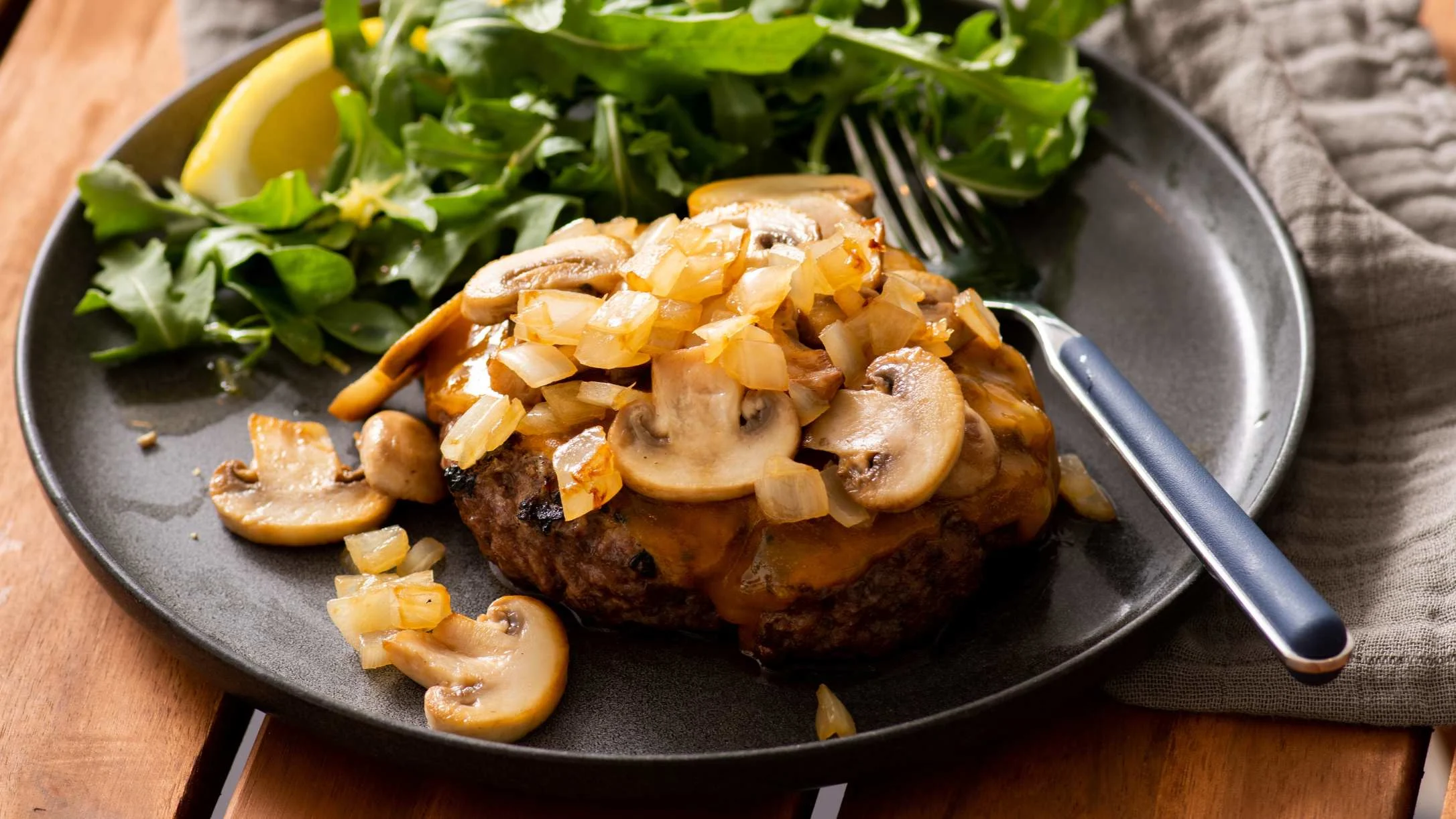 cheddar-burger-with-sauteed-mushrooms-and-onions 1
