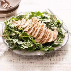 Chicken Over Baby Kale Caesar Salad