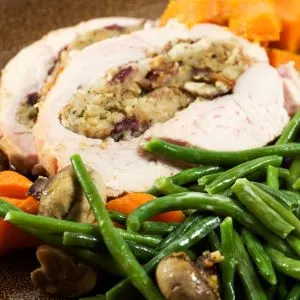 Turkey Breast Stuffed with Spiced Apple and Pumpkin with Sage