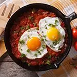 Beef Enchilada topped with an Egg over Spaghetti Squash
