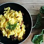 Eggs Scrambled with Cheddar, Swiss Chard and Canadian Bacon