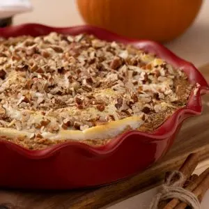 Pumpkin Pie Topped with Meringue and Toasted Nuts