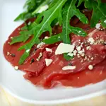 Keto Beef Carpaccio with Arugula and Caper Vinaigrette 