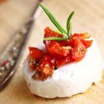 Keto Baked Brie with Sun-Dried Tomatoes and Pine Nuts Recipe | @Atkins