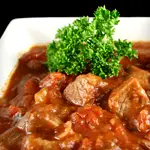 Veal Stew with Mushrooms and Smoked Provolone 
