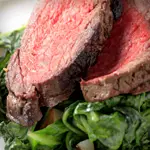 Keto Peppery Breakfast Steaks Over Wilted Spinach