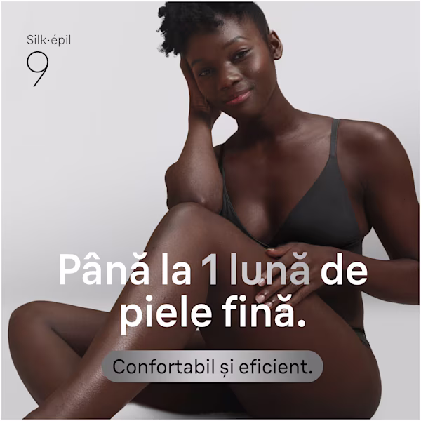 Imagine cu un model feminin care stă pe podea și se uită la cameră. Imagine cu un model feminin care stă pe podea și se uită la cameră.