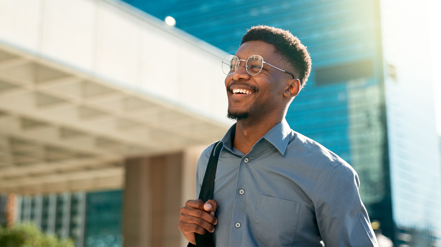 man walking and smiling