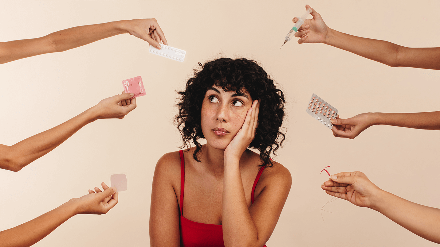 woman looking overwhelmed by the different birth control being offered around her