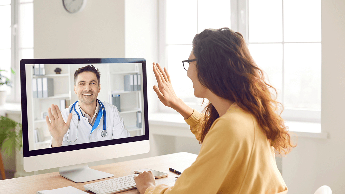 woman on a video call with her doctor