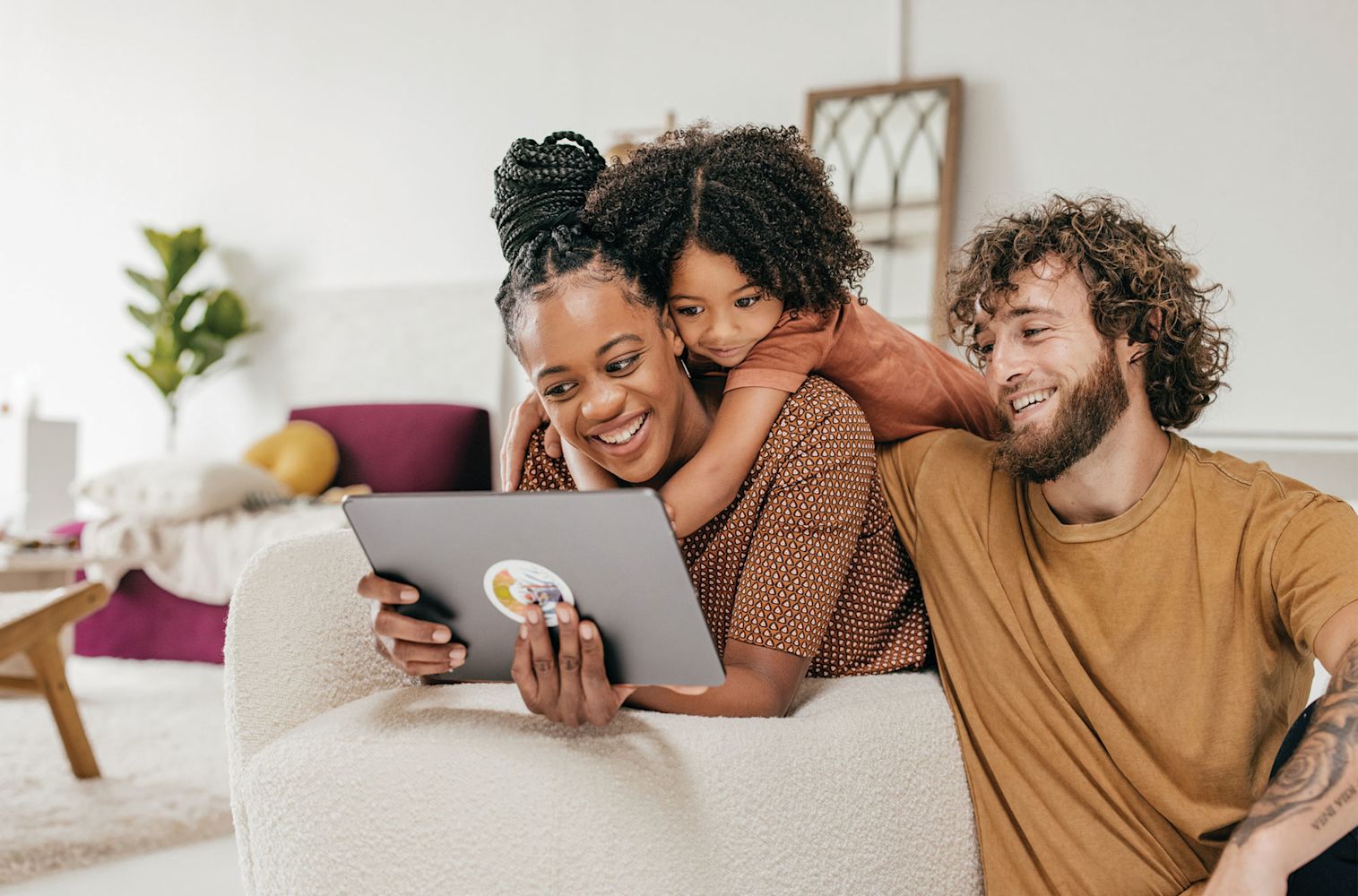 Family Reading Together about Financial Wellness