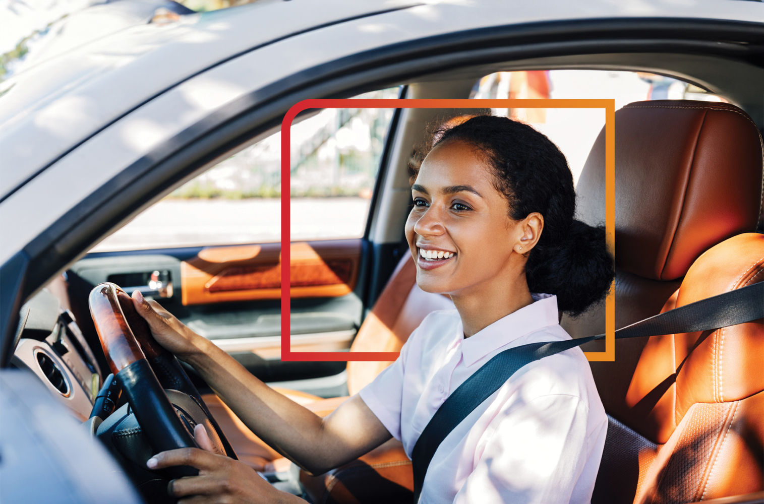 Woman enjoying her new car financed Financial Center