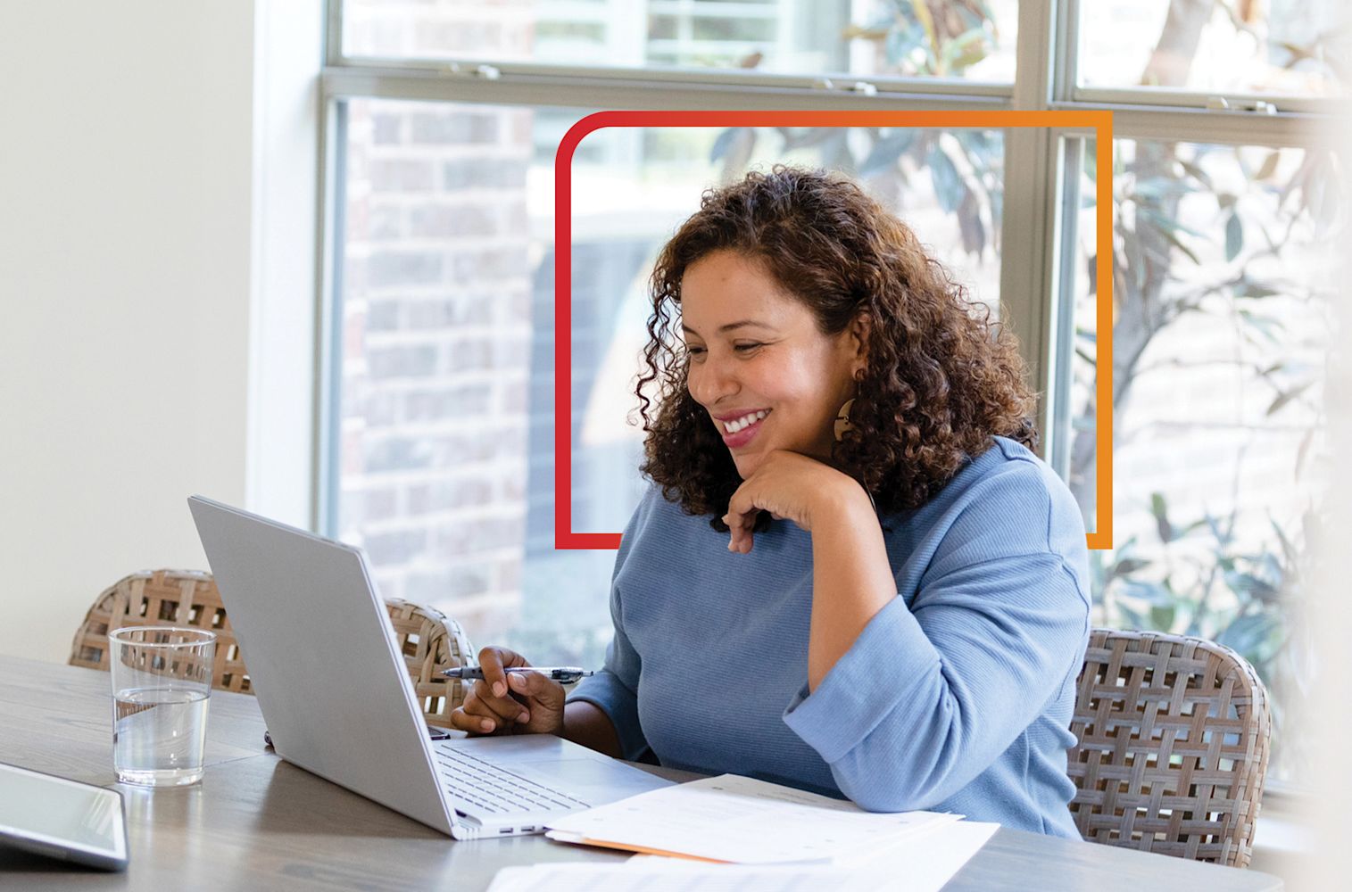 Woman looking at fcfcu.com for the next financial education workshop.