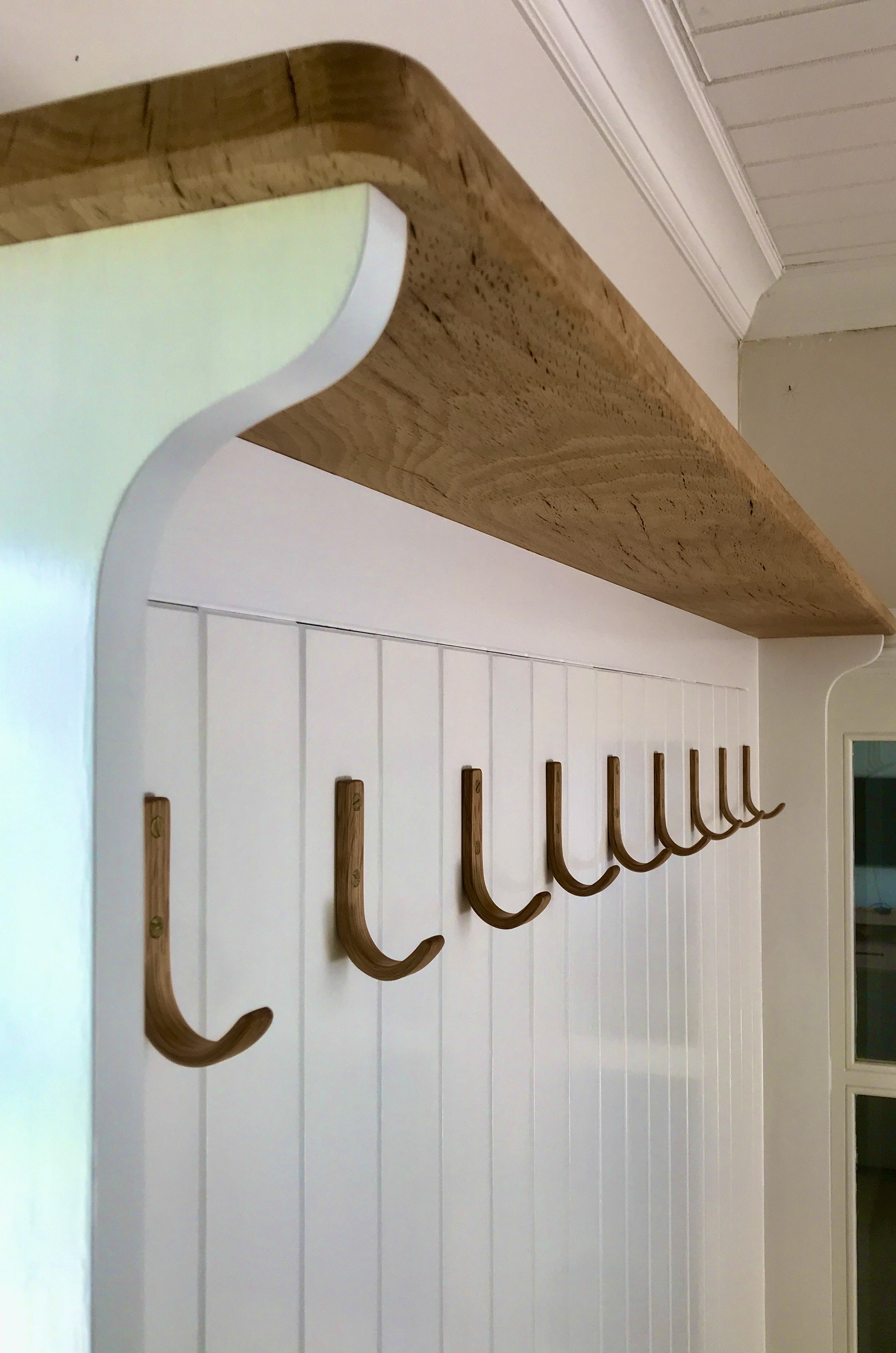 Coat hooks on wall unit