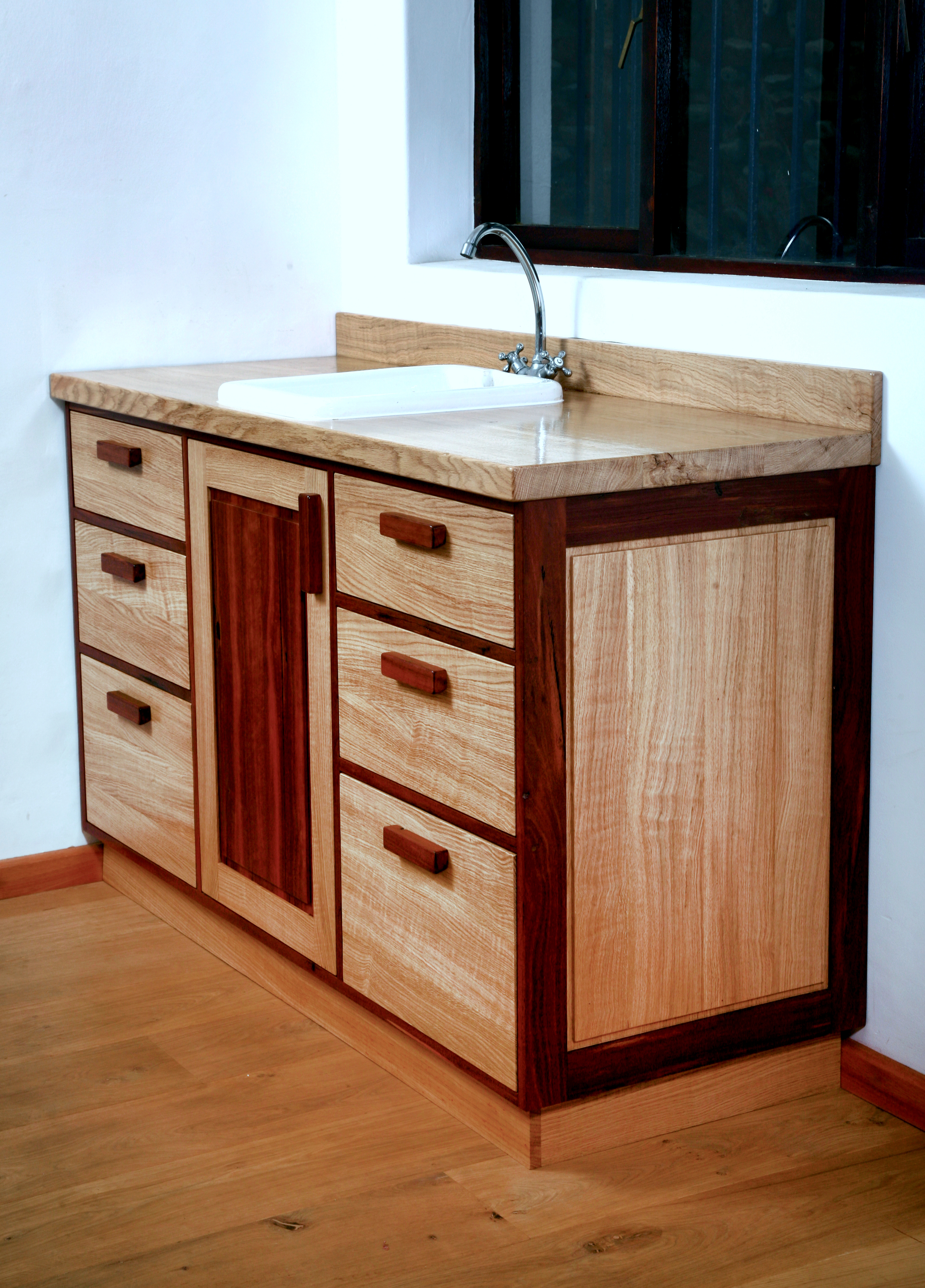Oak and Purple Heart sink cabinet.