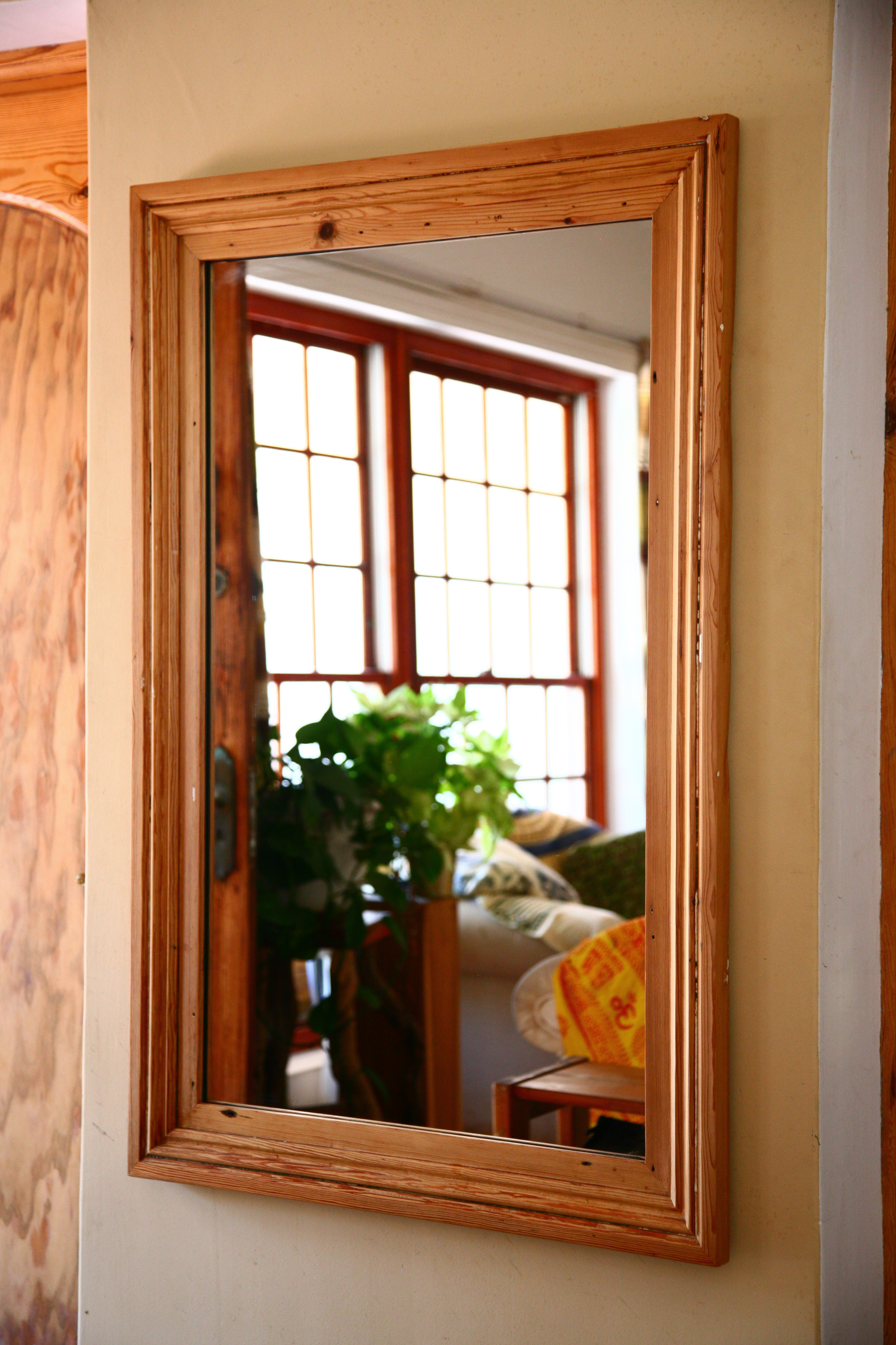 Oregon Pine mirror on a wall