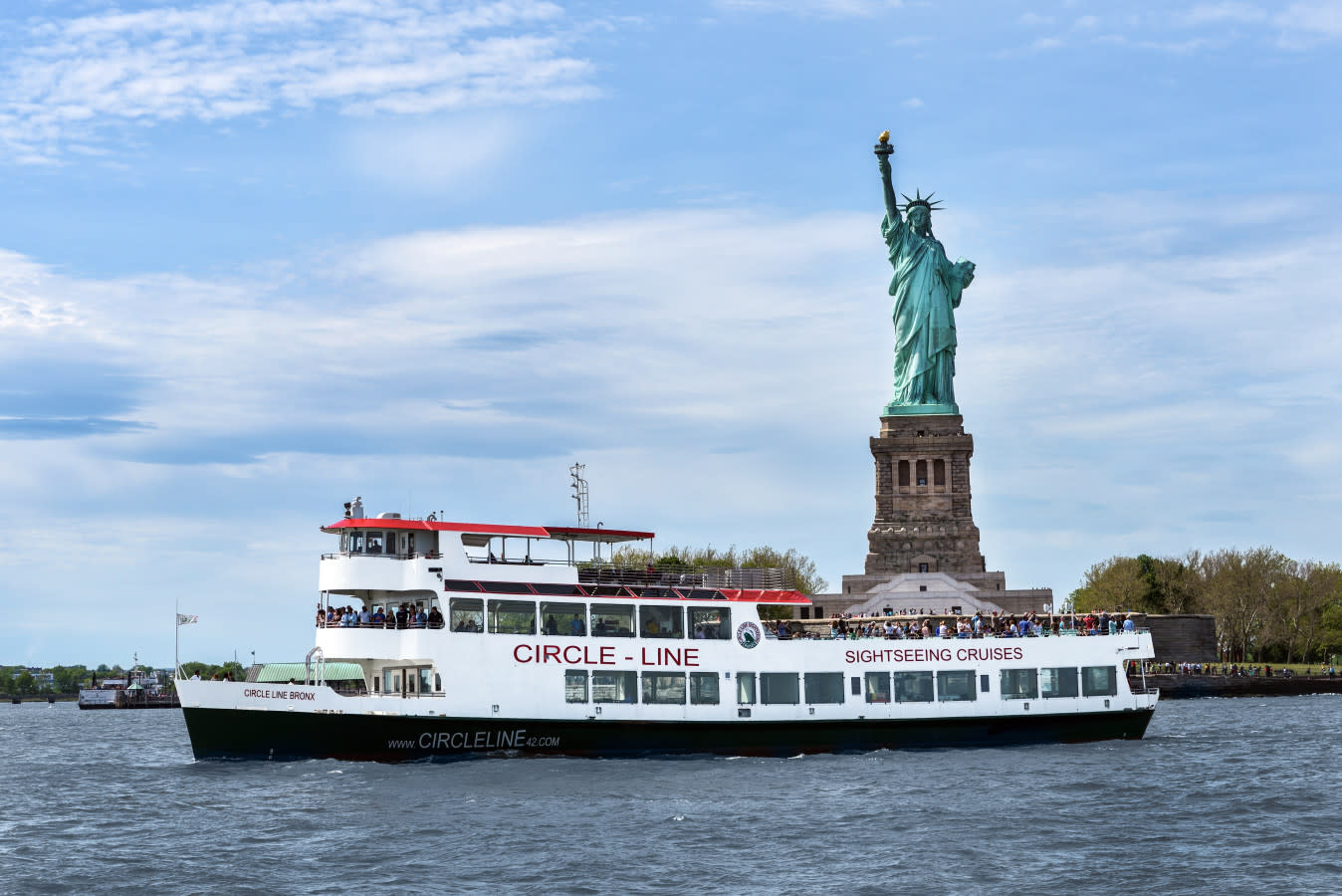 Circle Line Bronx Class with Statue of Liberty in background