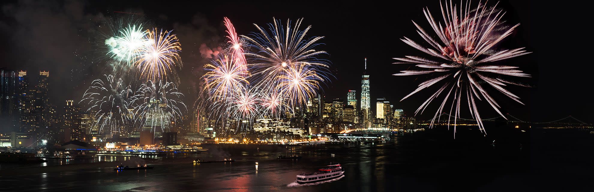 View of fireworks at night near Downtown Manhattan