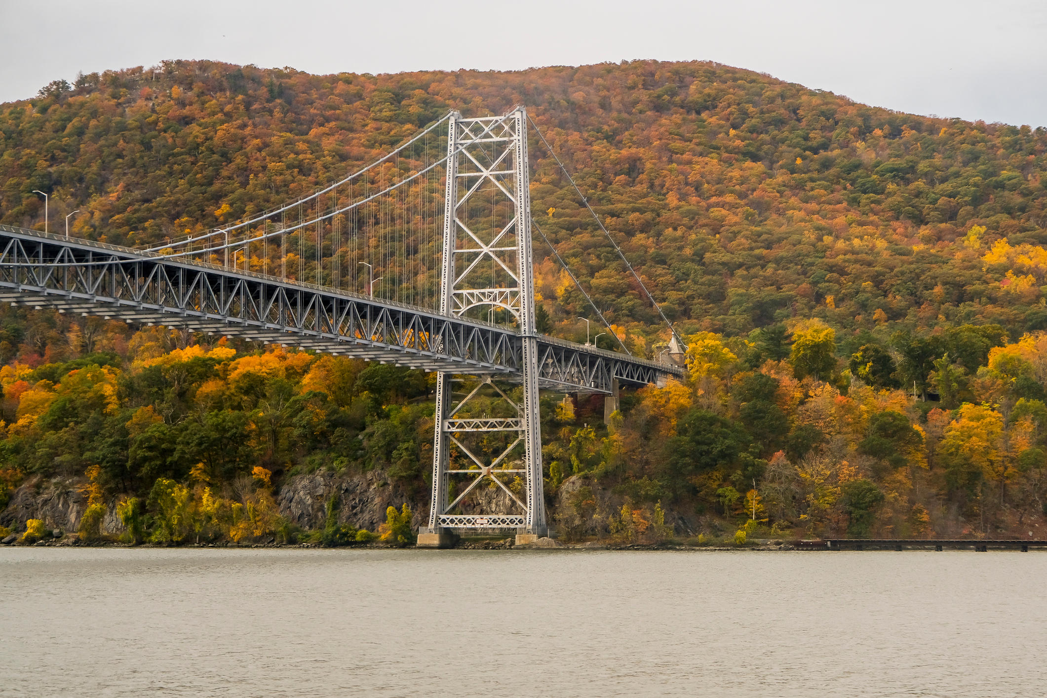 The Palisades are a line of steep cliffs rising up from the Hudson River to about 540 feet. These basalt cliffs were formed 200 million years ago at the close of the Triassic period by the intrusion of molten magma upward into sandstone. 