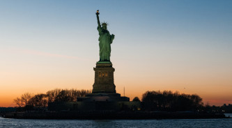 View of the Statue of Liberty in the evening