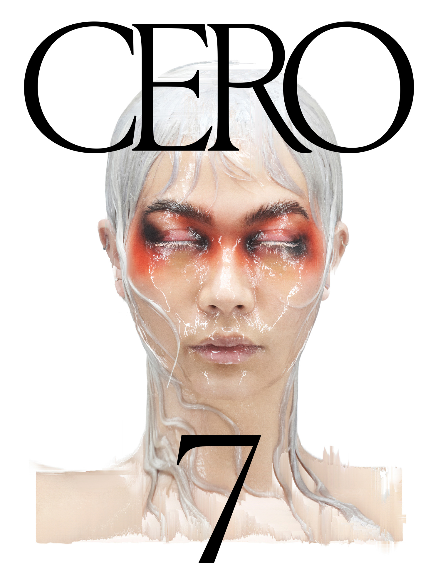 A figure is featured in the center of the image with silver hair that is slicked to the sides of the face and stuck to the neck as well. There is reddish brown eyeshadow that fills the eye socket area and extends down below the eyes. There is a glossy shine across the majority of the figure's face. At the top of the image CERO is written in large black text, and the number 7 is displayed in the bottom center of the image. 
