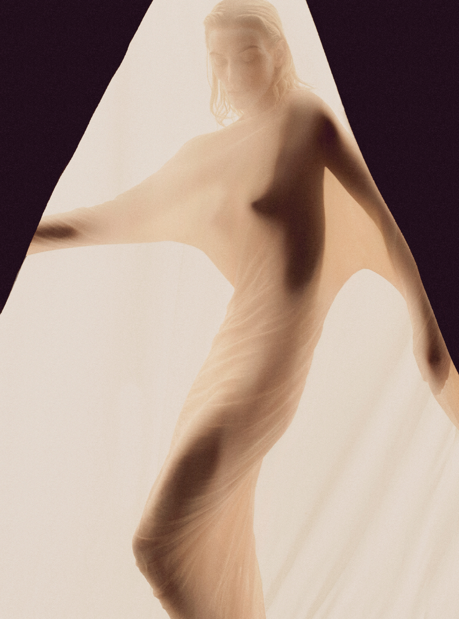 A woman model is behind a sheer fabric with light coming through it. There is a triangle shape where the model is being framed. 