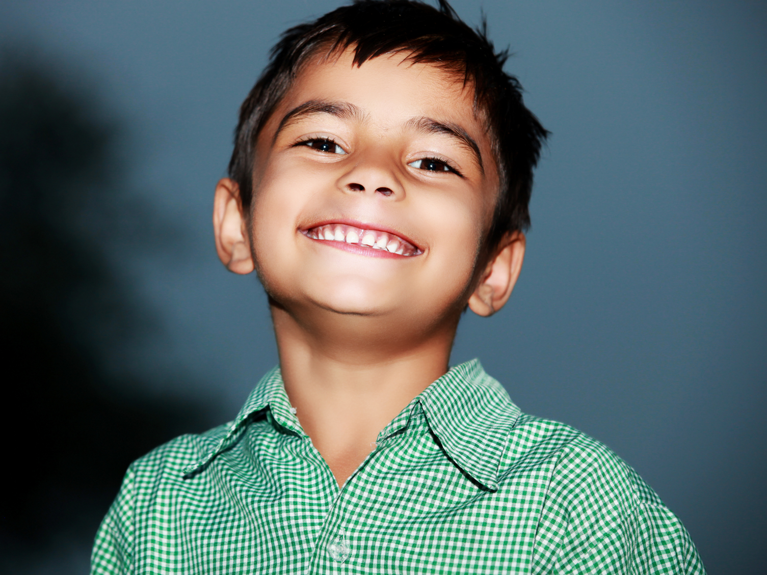 Child in Green Shirt 