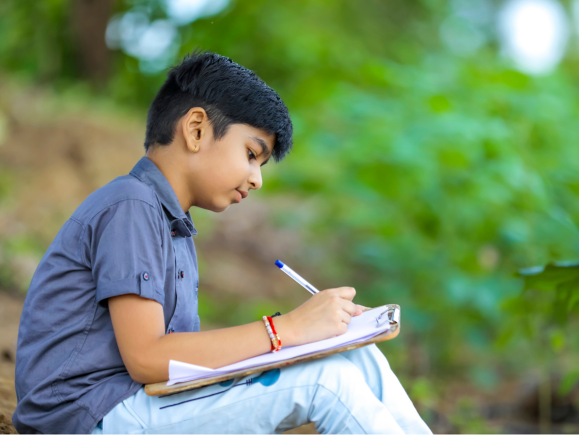 boy writing letter