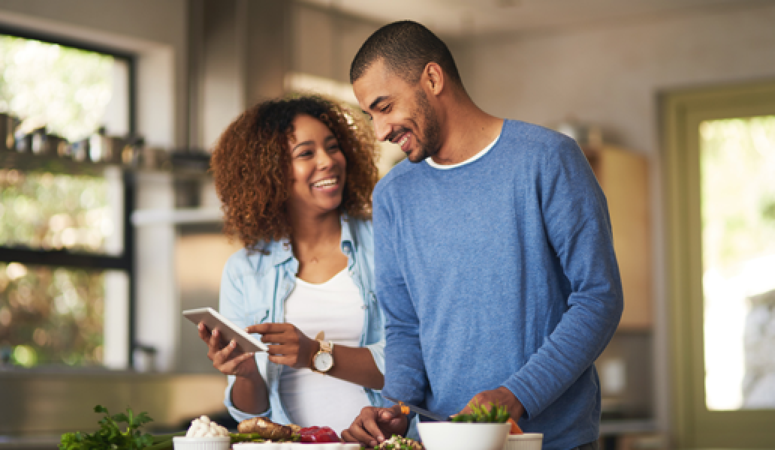 couple looking at mobile phone