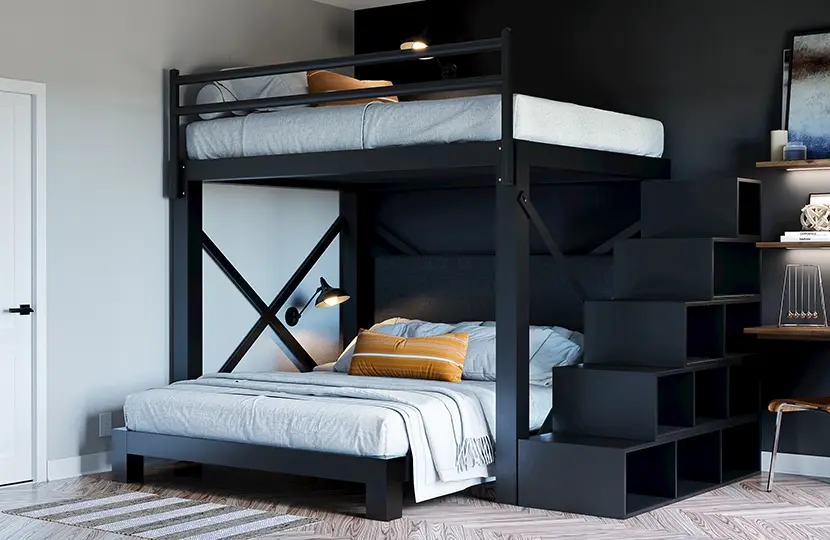 A black Full Over Queen size L-Shaped Bunk Bed for adults with matching wooden stairs in an upscale guest bedroom space. Seen from the lower left-hand corner of the bottom bunk.