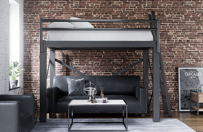 Charcoal Queen Adult Loft Bed in an upscale urban apartment with exposed brick walls and a nice black leather loveseat under the bed seen directly from the right-hand side of the bed away from the wall.