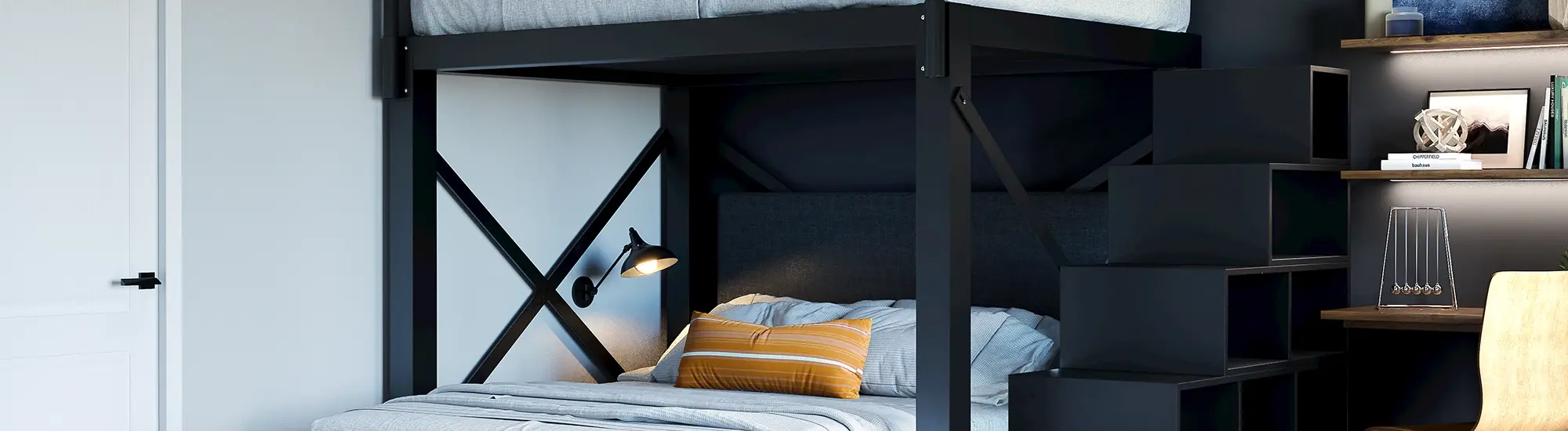 A black Full Over Queen size L-Shaped Bunk Bed for adults with matching wooden stairs in an upscale guest bedroom space. Seen from the lower left-hand corner of the bottom bunk.