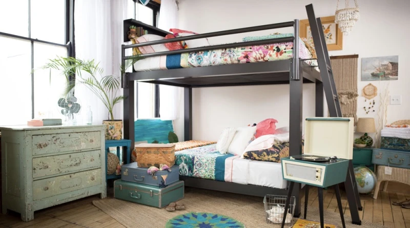 A charcoal Adult Bunk Bed sits in a fashionable modern apartment. 